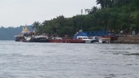 boats tied up to shore in Kawthaung, Myanmar