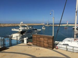photo of boats docked in Herzliya looking seaward.