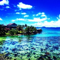 photo of Truk Lagoon, Weno, Chuuk flowing the reef and land