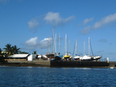 Boats drying on the wall outside the Yacht Club at Dzaoudzi, Mayotte
