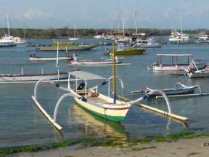 traditional balinese fishing boats at serangan harbour, bali