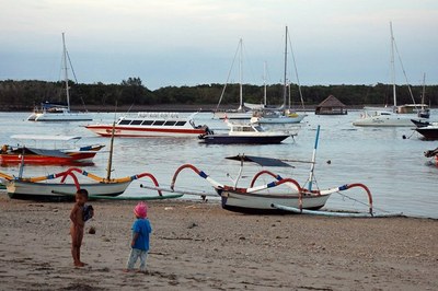 fishing boats on the beach and vessels anchored in serangan harbour