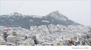 distant picture of Athens covered in snow
