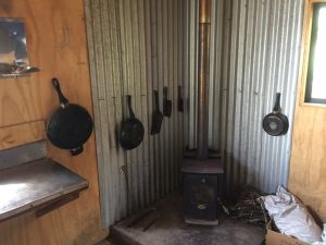 View of the inside of a hunters hut in port adventure, stewart island