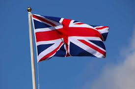 the UK flag - the union jack - flying in the wind