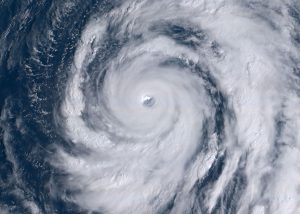 satellite view of the typhoon with swirling cloud mass over japan