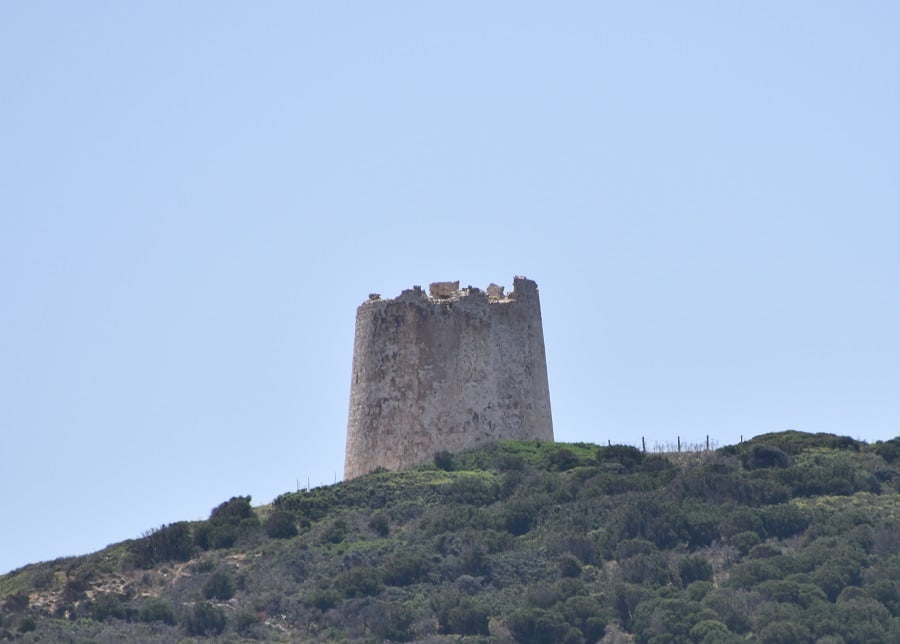 Stone Tower high on a cliff above the shore in Sardinia