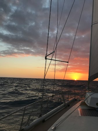 Sunset picture taken on board a yacht under sail.