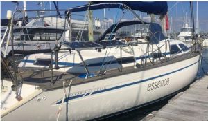 Yacht next to a gangway in a marina