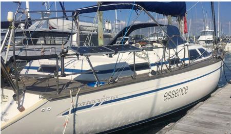 Yacht next to a gangway in a marina